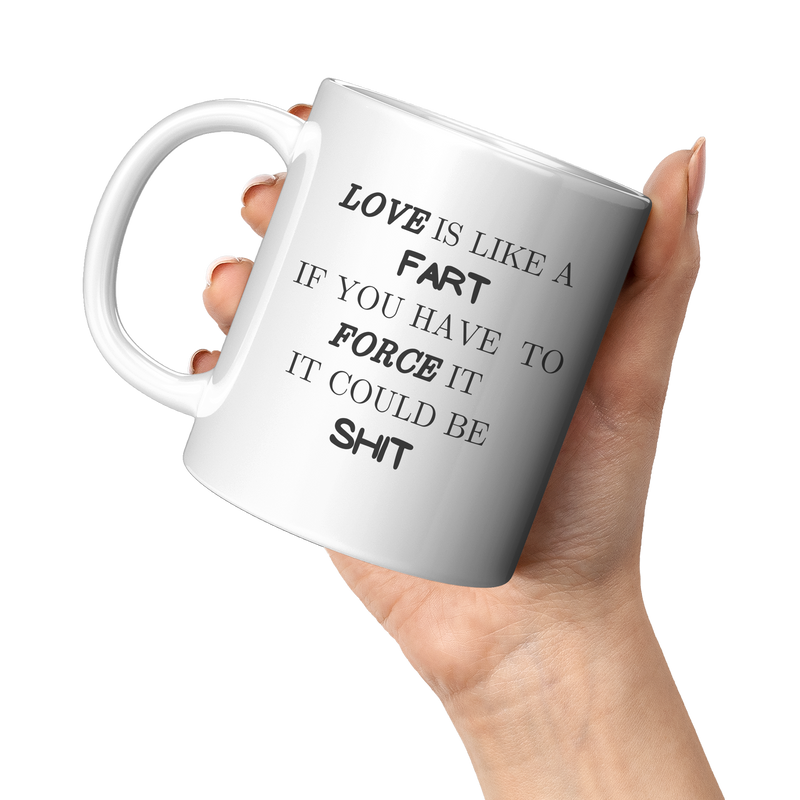Love_Is_Like_A_Fart__11_oz_White_Mug_11oz_White_LH_Model_Mockup.png